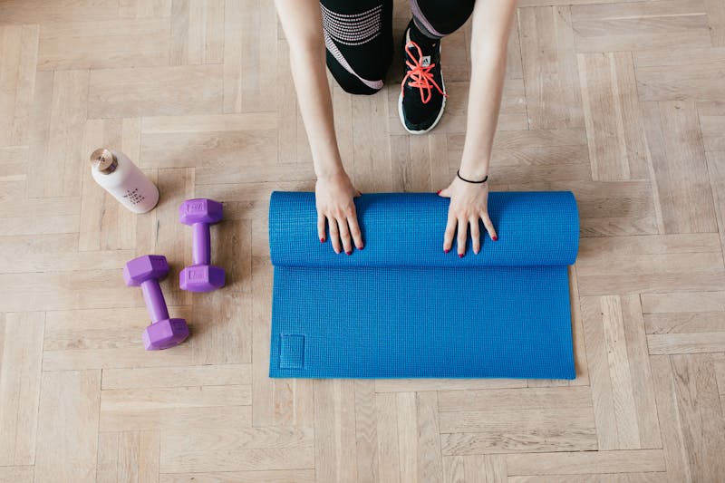 Man doing push-ups at home as part of a no-equipment bodyweight workout.