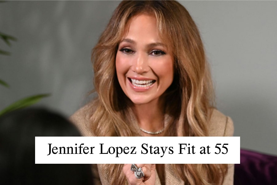 Jennifer Lopez smiling, showcasing her fitness and health at 55